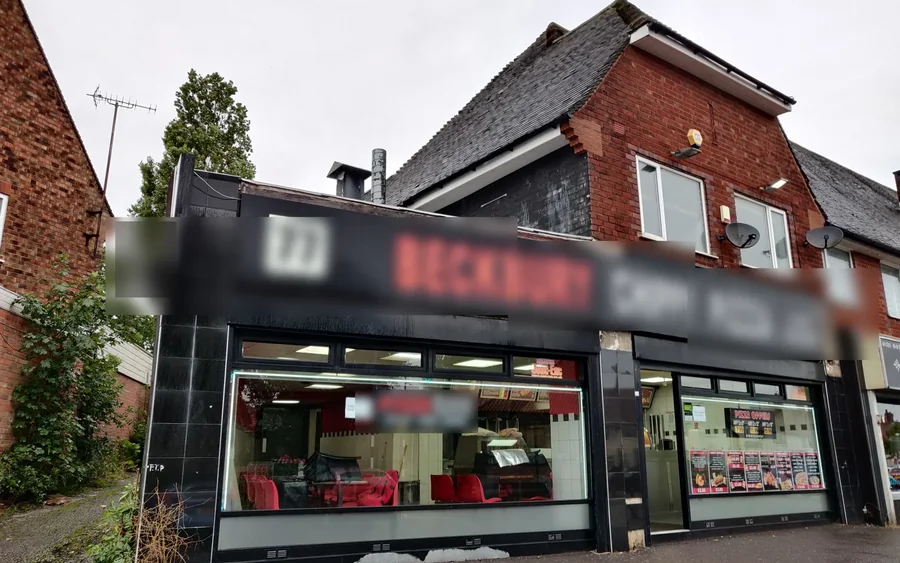 Existing mixed-use commercial unit in Weoley Castle, Birmingham where AXIOS ran feasibility and tendering; trading name removed